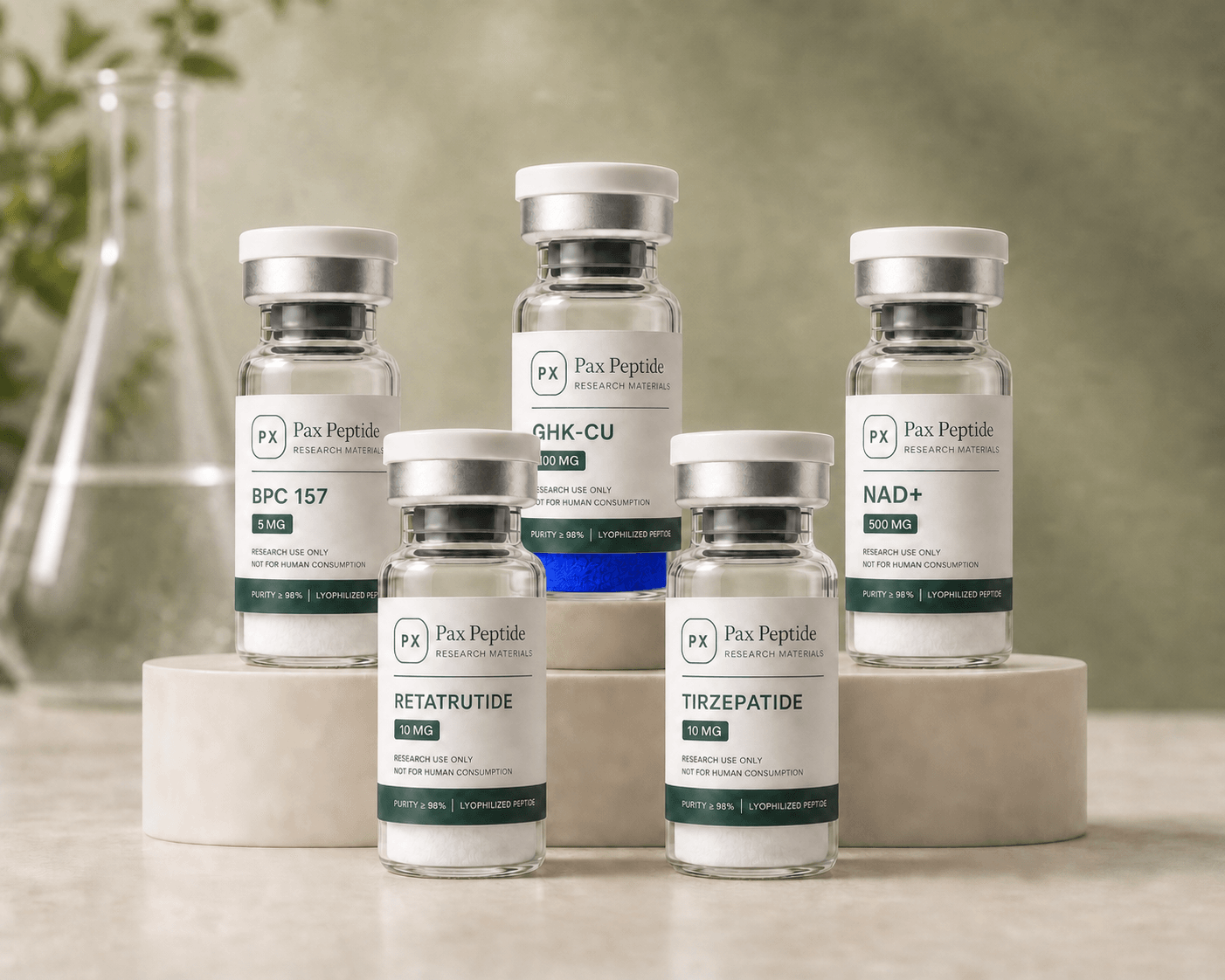 Pax Peptide research-material vials arranged in a product display